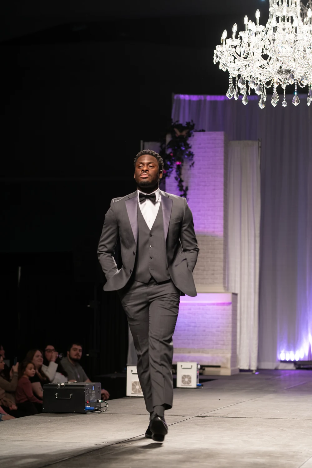 A men's formalwear look on the runway at a previous Wedding Fair event